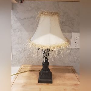 Decorative lamp with beads and yard accents, beige lamp shade and brown stand